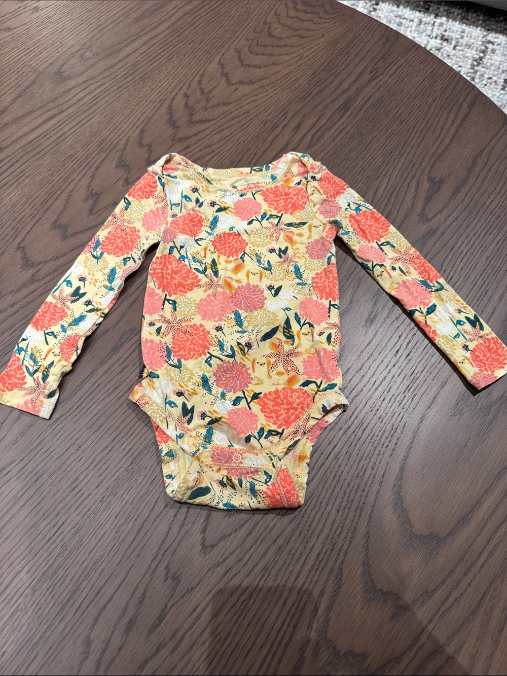 Tea Collection Yellow Floral Baby Onesie with Coral and Green Accents